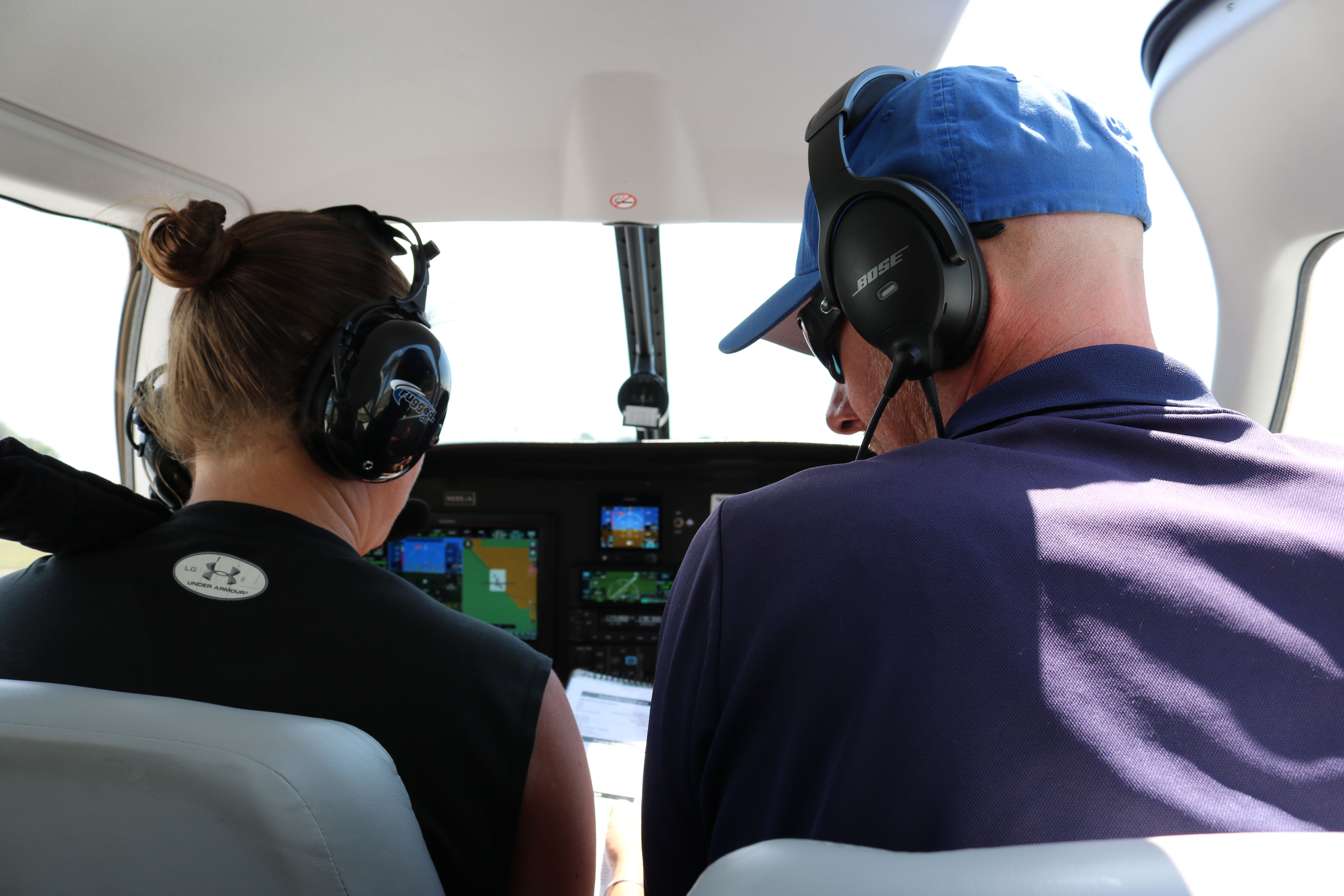 Certified flight instructor with student